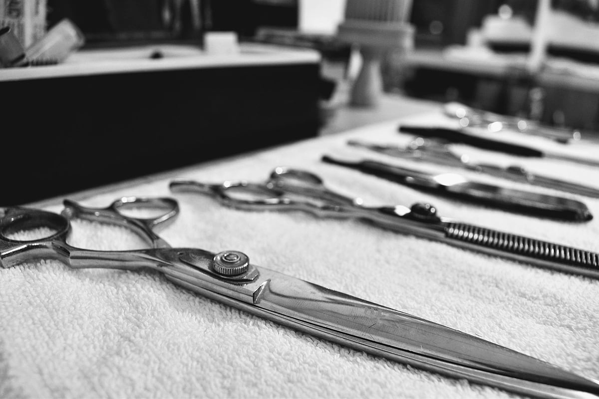 Black and white flat lay of vintage shears and clippers