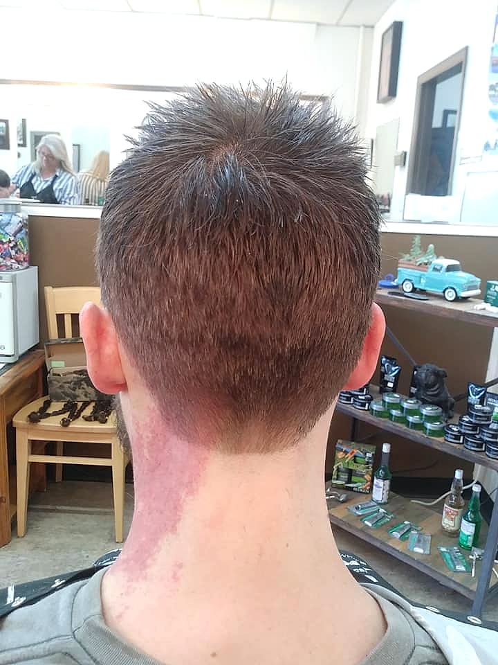 Back view of a short back and sides haircut